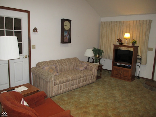 carpeted living room with lofted ceiling