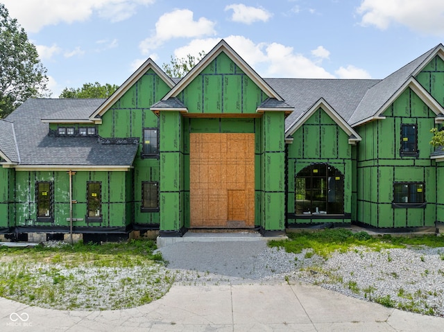 property in mid-construction featuring a gate