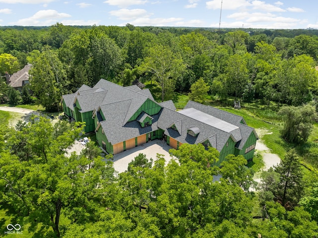 drone / aerial view with a forest view