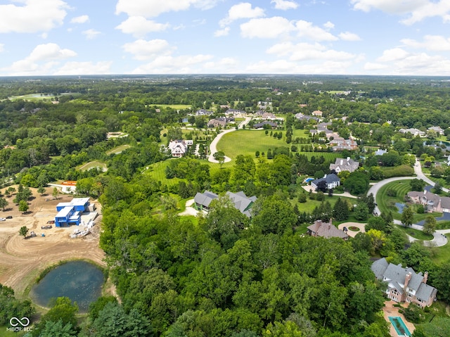 aerial view featuring a residential view and a water view