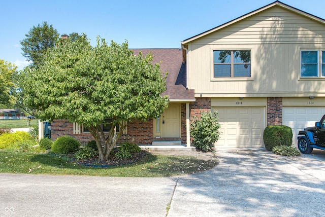 view of front of property with a garage