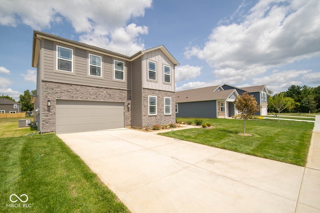 view of front facade with a front yard and a garage