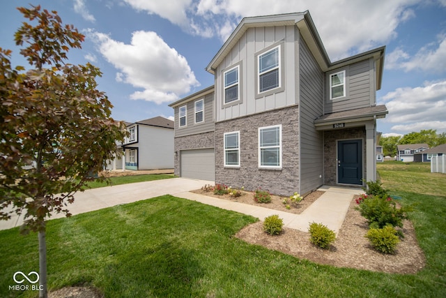 view of front of property featuring a front yard and a garage