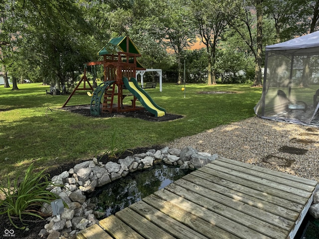 5647 W Mooresville Rd, Indianapolis, IN 46221 - view of yard featuring a gazebo and a playground