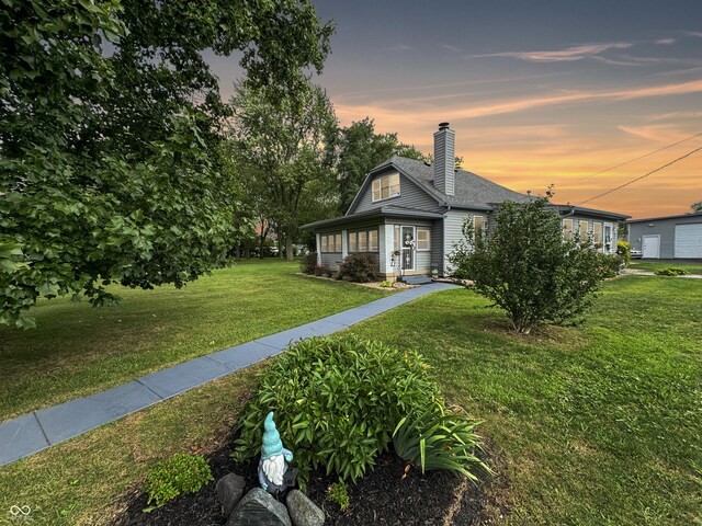 5647 W Mooresville Rd, Indianapolis, IN 46221 - view of front of house with a yard