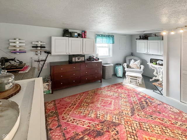 interior space featuring a textured ceiling