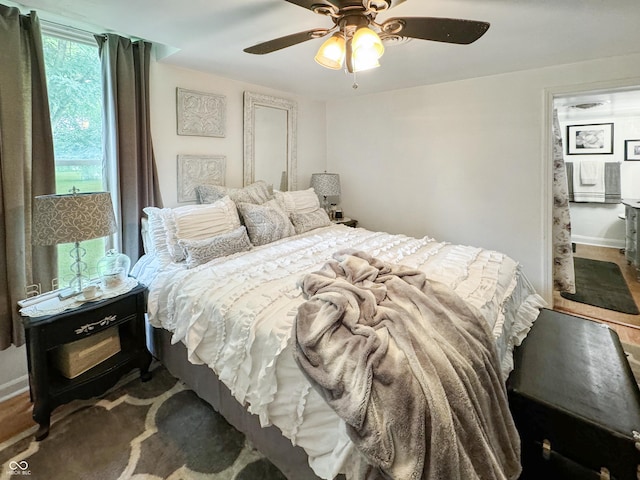 5647 W Mooresville Rd, Indianapolis, IN 46221 - bedroom with hardwood / wood-style flooring and ceiling fan