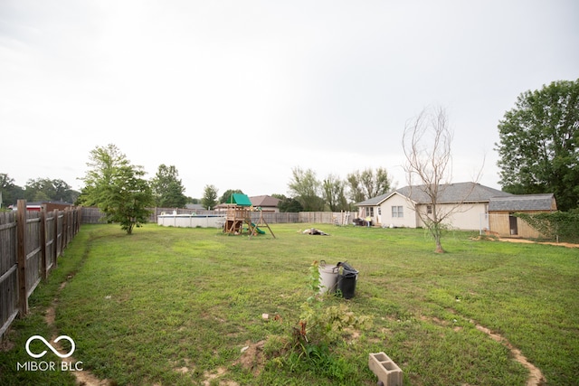 view of yard with a playground