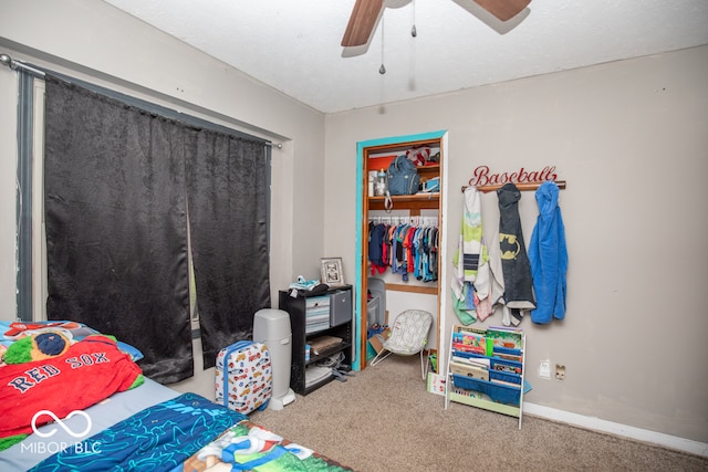 bedroom featuring a closet, carpet floors, and ceiling fan