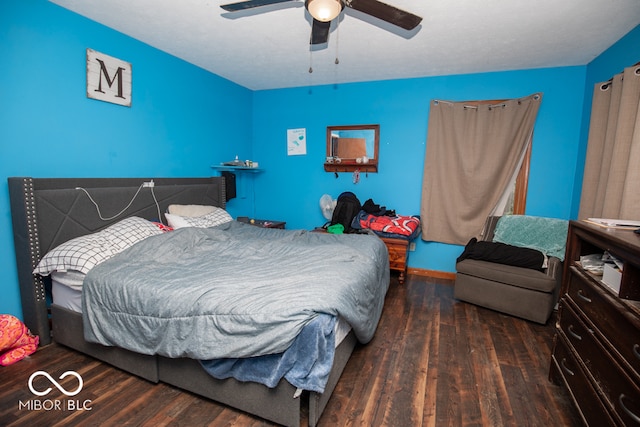 bedroom with ceiling fan and hardwood / wood-style floors