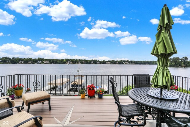 deck featuring a water view