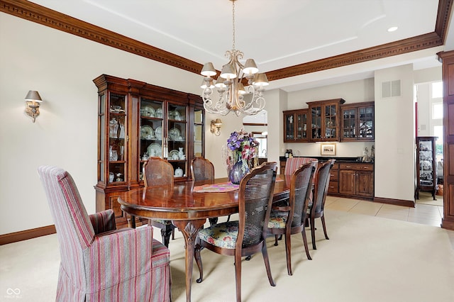 carpeted dining area with crown molding and an inviting chandelier