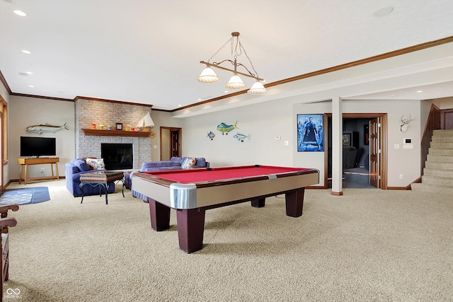 game room with ornamental molding, billiards, light colored carpet, and a fireplace