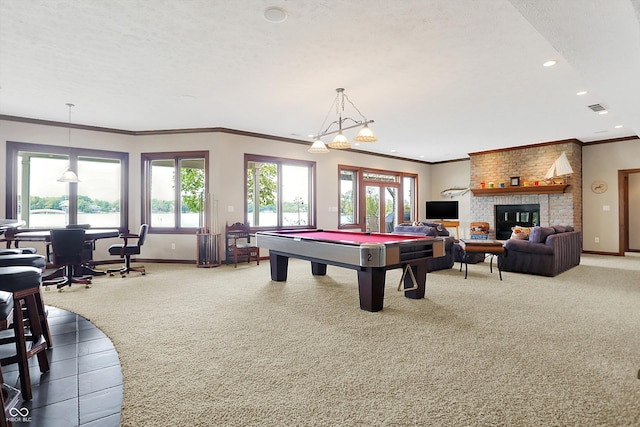 playroom featuring crown molding, pool table, carpet, and a healthy amount of sunlight