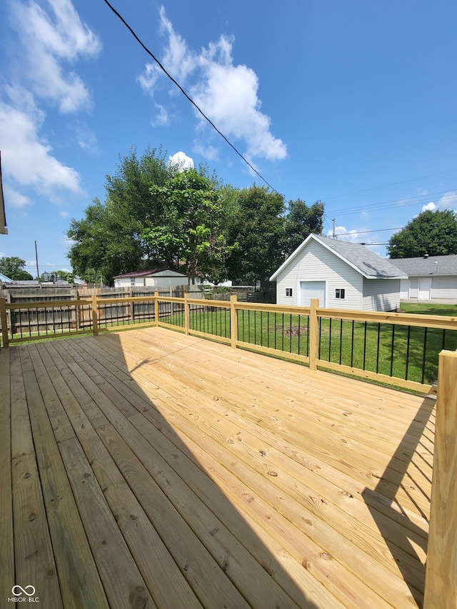 wooden terrace with a yard