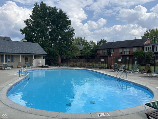 view of pool featuring a patio