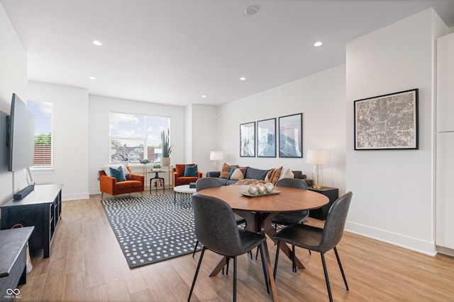 dining room with light hardwood / wood-style flooring