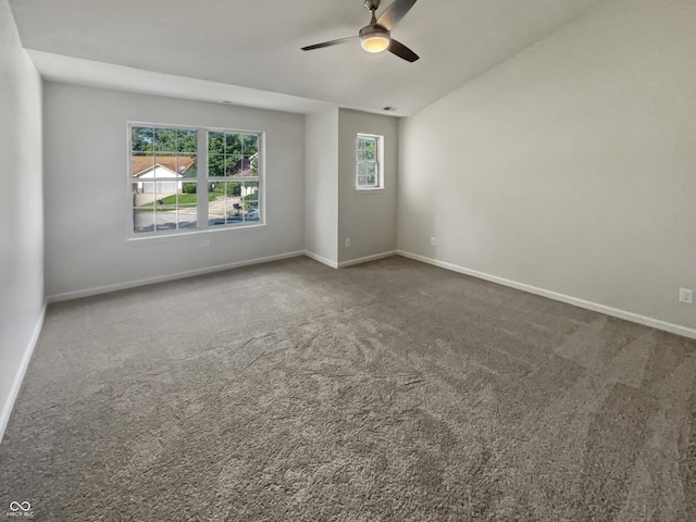 unfurnished room with carpet and ceiling fan