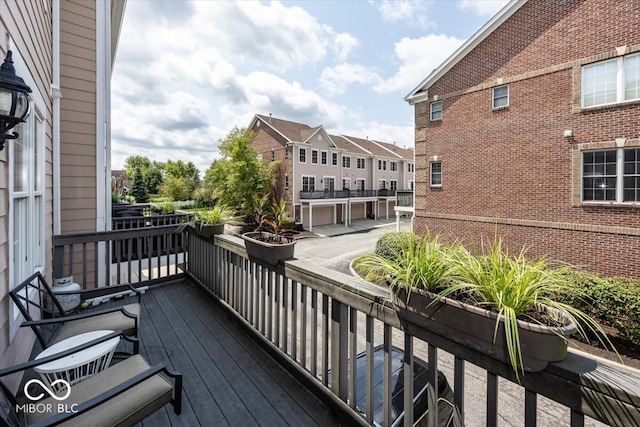 wooden deck with a garage