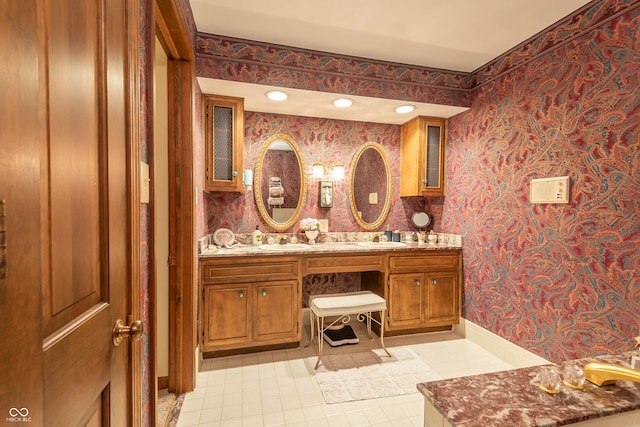 bathroom with vanity and tile patterned floors