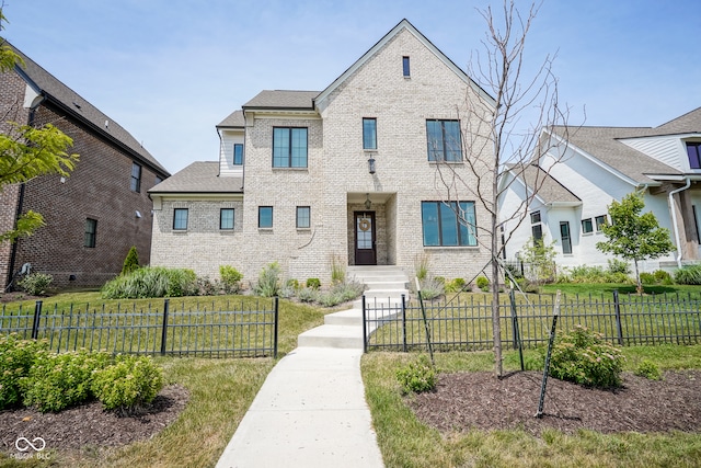 view of front of home featuring a front yard