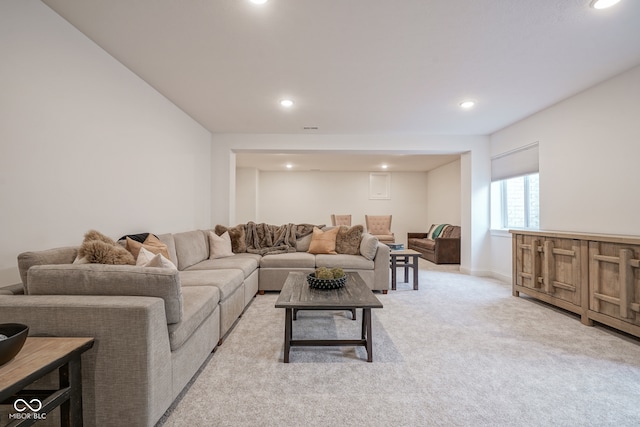 living room featuring light carpet