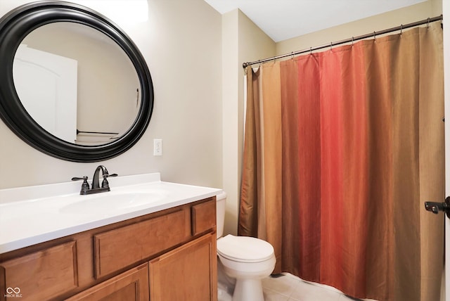 full bath featuring toilet, tile patterned flooring, and vanity