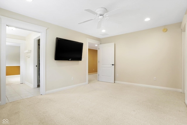 unfurnished bedroom featuring a ceiling fan, baseboards, light colored carpet, and recessed lighting