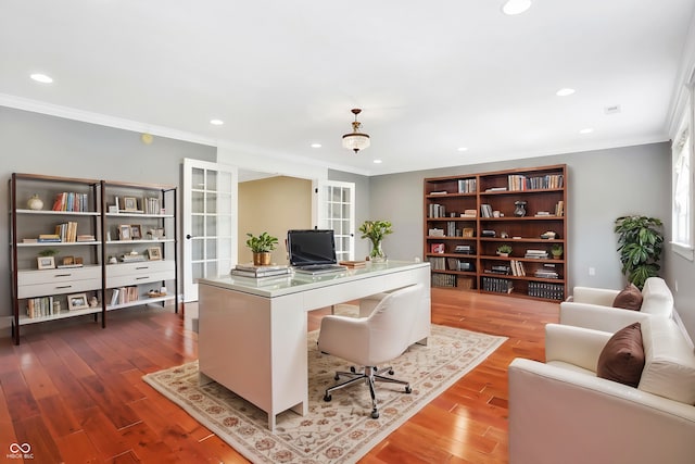 office featuring french doors, crown molding, wood finished floors, and recessed lighting