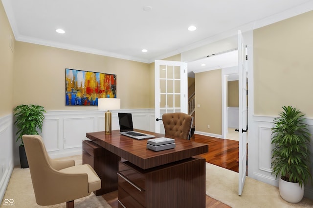 home office featuring ornamental molding, wood finished floors, recessed lighting, and wainscoting