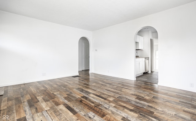 spare room with hardwood / wood-style flooring