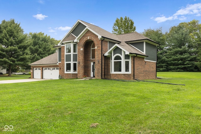 view of front of home featuring a garage and a front lawn