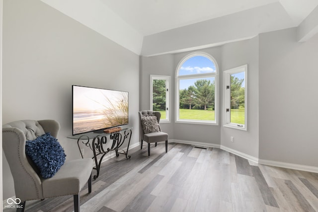 sitting room featuring light hardwood / wood-style flooring