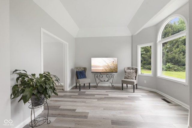 sitting room with light hardwood / wood-style flooring