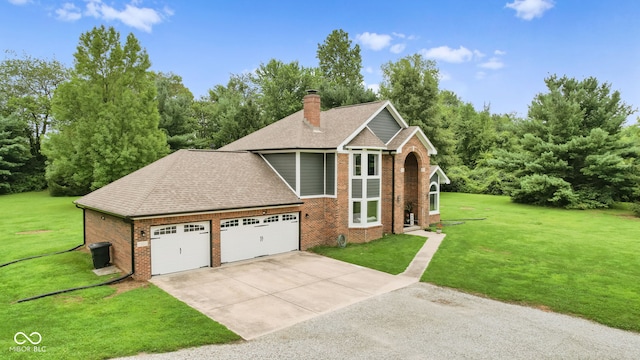 front of property featuring a front lawn and a garage