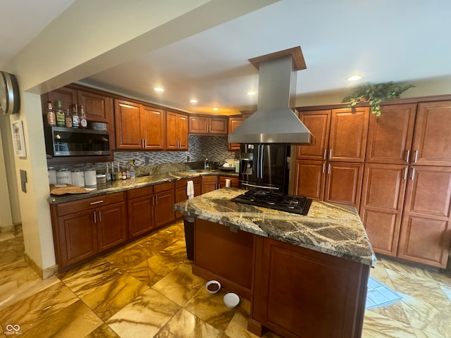 kitchen with decorative backsplash, dark stone counters, island range hood, light tile patterned flooring, and stainless steel appliances