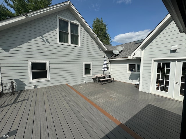 wooden terrace featuring french doors