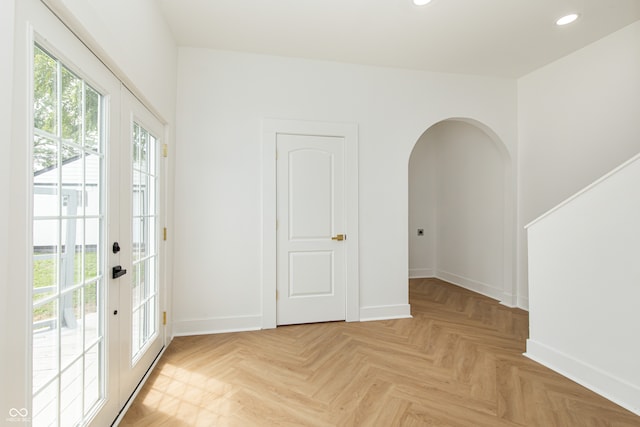 interior space featuring light parquet flooring and french doors