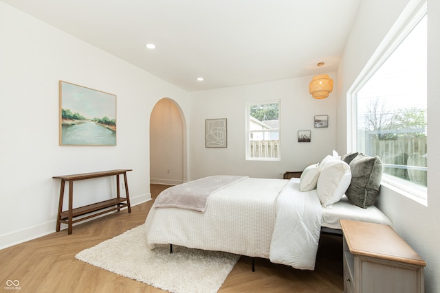 bedroom with parquet flooring