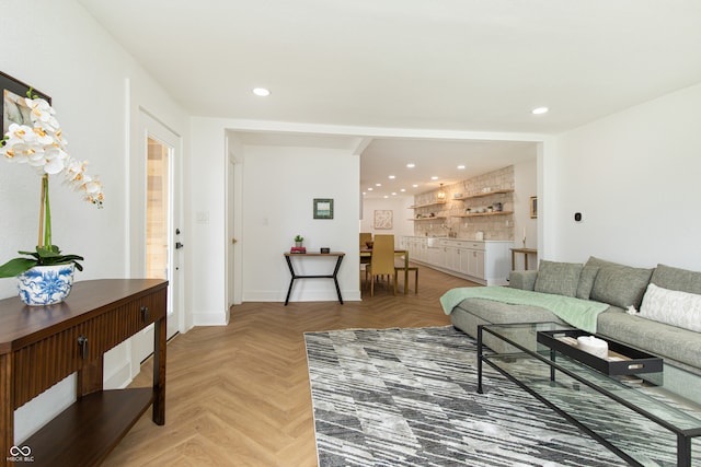 living room featuring parquet flooring