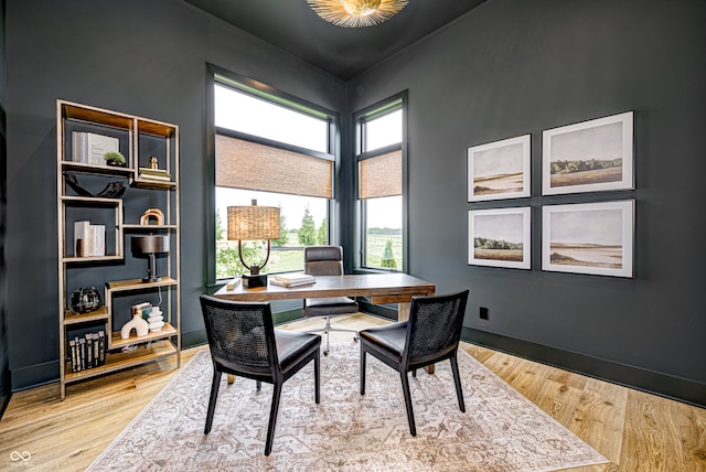 office with light wood-type flooring