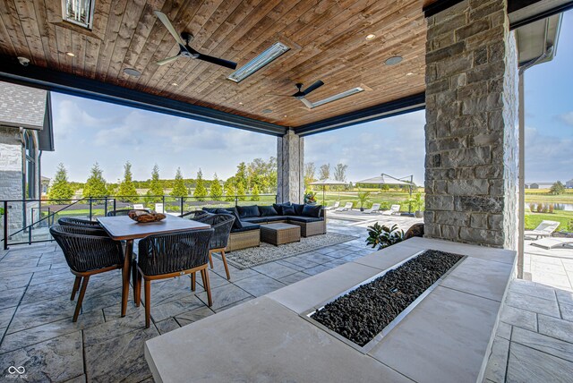 view of patio / terrace featuring outdoor lounge area and ceiling fan