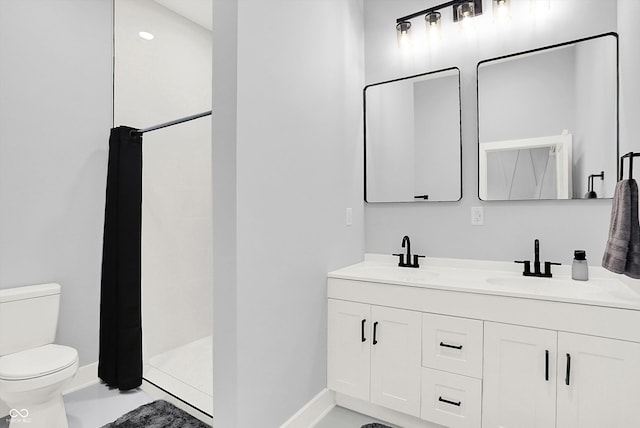 bathroom with dual vanity, toilet, tile patterned floors, and walk in shower