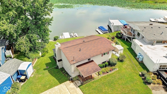 drone / aerial view with a water view