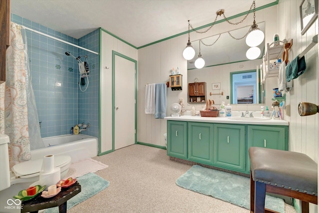 bathroom featuring vanity and shower / tub combo