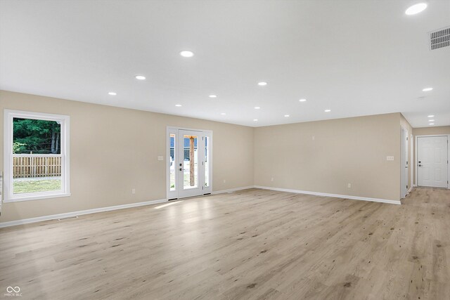 unfurnished room featuring light hardwood / wood-style flooring