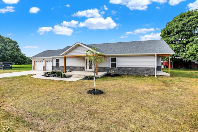 ranch-style house featuring a garage and a front yard