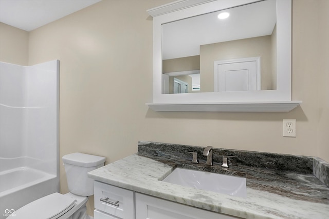 full bathroom featuring bathtub / shower combination, toilet, and vanity