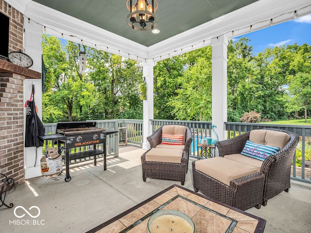 view of patio with an outdoor hangout area and a deck