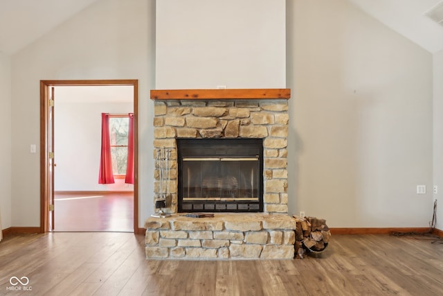 interior details featuring hardwood / wood-style floors and a fireplace